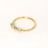 Claire's Bijoux Premium|Bijoux De Piercing-Anneau pour piercing de nez à quatre strass 0,6 mm couleur argentée et couleur dorée