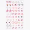Claire's Clips Et Autocollants-Boucles d’oreilles autocollantes tons de rose Claire's Club - Lot de 30