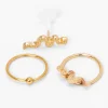 Claire's Bijoux De Piercing-Boucles d'oreilles arrière plat et anneau pour cartilage serpent variés 1,2 mm couleur dorée - Lot de 3