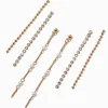 Claire's Pendantes-Boucles d'oreilles superposables perle d'imitation chaîne de strass couleur dorée - Lot de 3