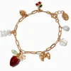 Claire's Bracelets-Bracelet de chaîne breloque Cherry Beary couleur dorée