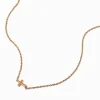 Claire's Colliers-Collier avec mini pendentif croix oblique couleur dorée