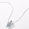 Claire's Colliers-Collier à pendentif tortue décoré bleu et violet couleur argentée