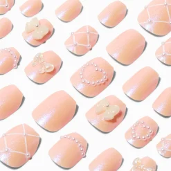 Claire's Ongles-Faux ongles vegan autocollants ballerine nœud nude 3D - Lot de 24