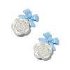 Claire's Pendantes-Pendantes rose sculptée blanche nœud bleu