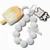 Claire's Porte-clés-Porte-clés bracelet glace à l'eau chat perle d'imitation