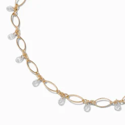 Claire's Colliers-Ras-de-cou pendant ovale délicat en zircon cubique couleur dorée